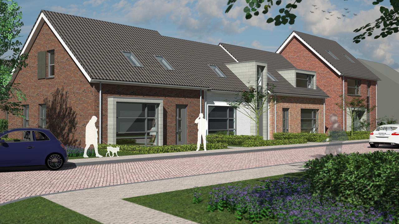 De zinken kaders geven de verder traditionele woningen een modern accent